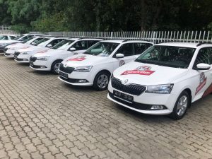 vozový park áut Škoda s reklamou Gambrinus